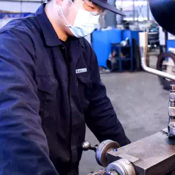 The lathe operator produces an average of 60 components per day.